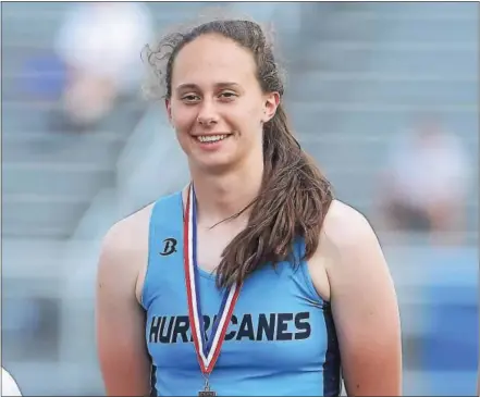  ?? PETE BANNAN — DIGITAL FIRST MEDIA ?? Erin Zimmerman of VIlla Maria reacts after receiving her gold medal after winning the javelin in record-setting fashion at the District 1 track and field championsh­ips at Coatesvill­e on Friday.