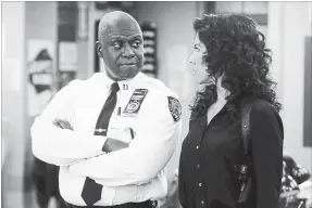  ?? JOHN P FLEENOR THE ASSOCIATED PRESS ?? Andre Braugher, left, and Stephanie Beatriz in “Brooklyn Nine-Nine.” Braugher plays a gay man, Capt. Ray Holt, and Beatriz’s character, Det. Rosa Diaz, recently came out as bisexual.