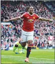  ??  ?? Manchester United’s French striker Anthony Martial celebrates scoring the opening goal during the English Premier League football match between Manchester United and Everton at Old Trafford in Manchester, north west England,
on April 3.