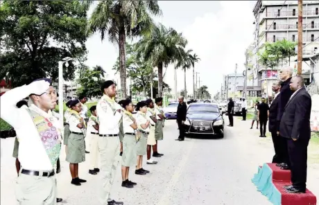  ?? (Ministry of the Presidency photo) ?? President David Granger receiving the ‘Guard of Honour’ salute mounted by the Pathfinder­s upon his arrival at the Central Seventh-day Adventist Church at Church and Oronoque Streets