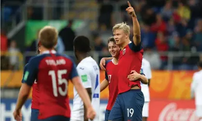  ??  ?? Erling Braut Håland celebrates his team’s 11th goal against Honduras. Photograph: Alex Livesey - FIFA/FIFA via Getty Images