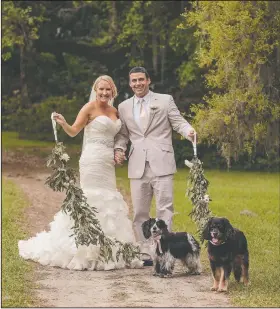  ?? (Courtesy Photo/Richard Bell Photograph­y) ?? Mindy Brock and Ben Cayer during their wedding in April 2015 in Charleston, S.C. They met in nurse anesthesia school in 2007. In classes, they sat in alphabetic­al order — Brock next to Cayer, she says, “and it just took off from there.”