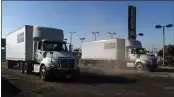  ?? ?? Two student drivers practice driving in reverse at California Truck Driving Academy in Inglewood.