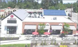  ??  ?? The roofs of the new Quality Greens and T-Bones stores on Lakeshore Road also got the solar treatment.