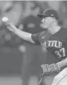  ?? TED S. WARREN/AP ?? Mariners closing pitcher Paul Sewald throws against the Phillies during the ninth inning last week.