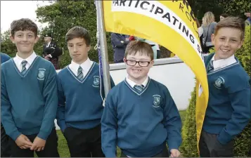  ??  ?? Gearoid Murphy, Cathan McCarthy, Michael Clarke and Patrick Kavanagh with the Young Entreprene­ur Flag.