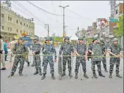  ?? AMAL KS/HT PHOTO ?? Security personnel deployed in the Jahangirpu­ri area on Thursday. Police have cordoned off the C-block locality after violent clashes on Saturday.