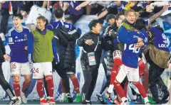  ?? REUTERS ?? Yokohama F Marinos players celebrate winning the penalty shoot-out.