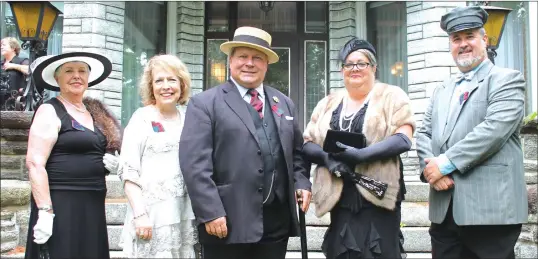  ?? GORDON LAMBIE ?? Chantal L'esperance, President of the Rendez-vous d'howard, (in white) with some of the re-enactors who will be present at Sherbrooke's Domaine Howard park in early September to walk visitors through local history. Among the personalit­ies who will be present are Senator Charles Benjamin Howard himself (seen here at centre) as well as notable Sherbrooke textile mill owner Andrew Paton.