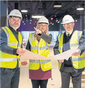  ?? ?? BOWLING BASE: Regional manager Steven Bremner, centre manager Laura MacDougall, and Stewart Hosie MP at the new Hollywood Bowl.