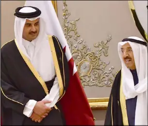  ??  ?? أمير الكويت الشيخ صباح الأحمد وأمير قطر الشيخ تميم بن حمد