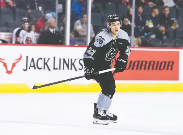  ??  ?? Defenceman Jett Woo seems to be over another snub from Team Canada. He compiled six points in five games for the WHL’s Calgary Hitmen and was named to the CHL’s team of the week.