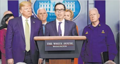  ?? Evan Vucci The Associated Press ?? Treasury Secretary Steven Mnuchin speaks Tuesday during a press briefing with the coronaviru­s task force at the White House.