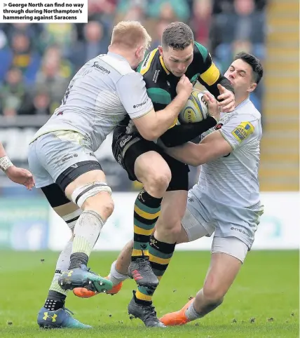  ??  ?? > George North can find no way through during Northampto­n’s hammering against Saracens