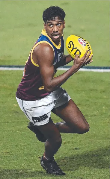  ??  ?? Keidean Coleman of the Brisbane Lions runs with the ball during the round 17 AFL match against the Sydney Swans at Cazaly's Stadium. Picture: Getty Images