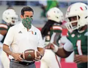  ?? AL DIAZ adiaz@miamiheral­d.com ?? After the Hurricanes’ defense plummeted this past season, coach Manny Diaz is taking control on game days.