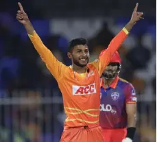  ?? Photo: ILT20 ?? Zuhaib Zubair celebrates the dismissal of Dubai Capitals’ Rahul Chopra in his debut match for Gulf Giants in the ILT20