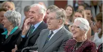  ??  ?? Stan, left, Colin and Verna Meads enjoy a laugh at the ceremony to unveil Sir Colin’s statue.