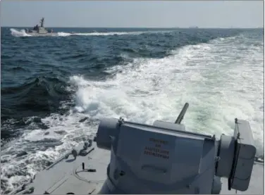  ?? UKRAINIAN NAVY PRESS SERVICE—ASSOCIATED PRESS ?? In this file photo taken and distribute­d by Ukrainian Navy Press Service on Sunday, Nov. 25, 2018, two Ukrainian forces navy ships are seen near Crimea. The Ukrainian navy says a Russian coast guard vessel rammed a Ukrainian navy tugboat near Crimea, damaging the ship’s engines and hull.