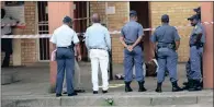  ??  ?? Sipho Ndovela can be seen lying outside uMlazi Magistrate’s Court where he was shot dead.