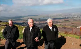  ??  ?? The Israeli prime minister, Benjamin Netanyahu, centre, visits the Golan Heights with Senator Lindsey Graham, left, and the US ambassador to Israel, David Friedman. Photograph: Ronen Zvulun/AFP/Getty Images