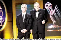  ??  ?? Tom Bergeron (Left) and Peter Marshall speak onstage during the 45th annual Daytime Emmy Awards at Pasadena Civic Auditorium on Sunday in Pasadena, California.