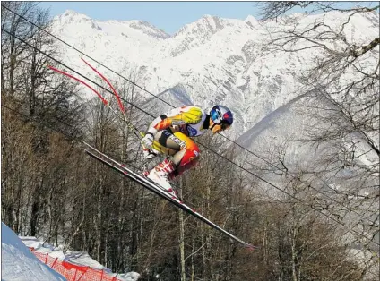  ?? WOLFGANG RATTAY/ REUTERS ?? Erik Guay clears the ‘ Russian Trampoline’ jump during the apractice run in Rosa Khutor, near Sochi earlier this week.