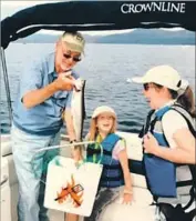 ?? Skelton family photo ?? GEORGE SKELTON with granddaugh­ters Annemarie and Frances Barbour at Lake Tahoe in 2007.