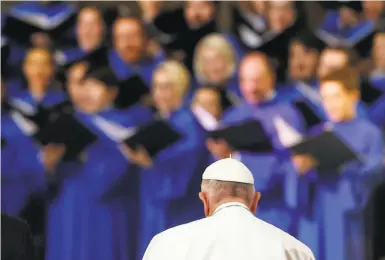  ?? Patrick Semansky / AFP / Getty Images ?? Pope Francis enters the Basilica of the National Shrine of the Immaculate Conception before the outdoor Mass.