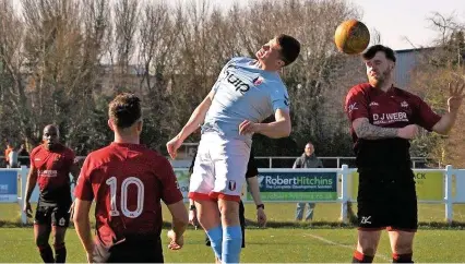  ?? Picture: Peter Langley ?? Action from the Gloucester­shire County League game between Quedgeley Wanderers and Rockleaze Rangers (red) last Saturday, which Quedgeley won 3-2