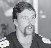  ?? JOE BURBANK/ORLANDO SENTINEL ?? UCF’s Jake Hescock shows off a unique mustache during UCF football media day on Tuesday.