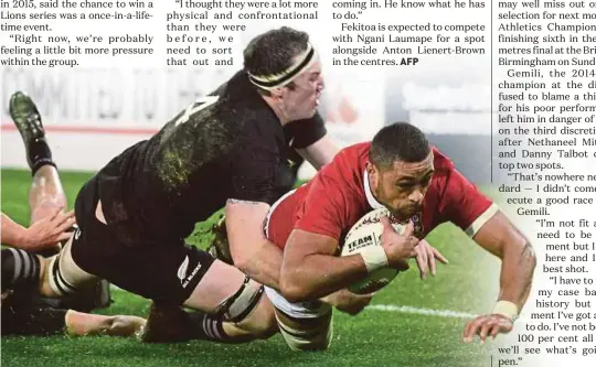  ?? AFP PIC ?? British and Irish Lions’ Taulupe Faletau (right) scores a try as he is tackled by New Zealand All Blacks’ Brodie Retallick during their second Test on Saturday.