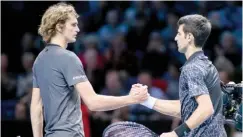  ?? World number one, Novak Djokovic of Serbia (R) shaking hands with Alexander Zverev of Germany at the end of this year’s ATP final ??
