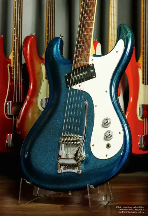  ?? ?? With its offset body and cool bluesparkl­e finish this rare guitar is redolent of the bygone surf-era