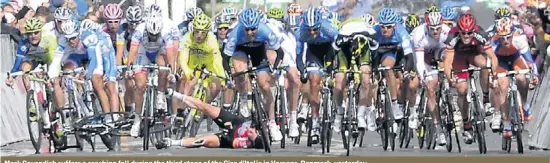  ??  ?? Mark Cavendish suffers a crashing fall during the third stage of the Giro d'italia in Horsens, Denmark, yesterday