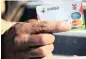  ?? PHOTO: DAVID RITCHIE ?? A Sassa debit card for welfare beneficiar­ies. After a Constituti­onal Court order last month, CPS signed an addendum to its existing contract for a further 12 months.