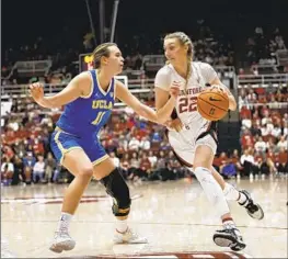  ?? Josie Lepe Associated Press ?? STANFORD FORWARD Cameron Brink, who scored 25 points, drives against UCLA forward Emily Bessoir during the Cardinal’s 71-66 win over the Bruins.