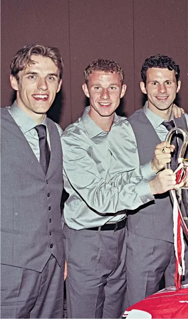  ??  ?? Pathway to greatness: Giggs and Eric Harrison (centre) hold the European Cup in 1999 with rest of the Class of ’92 and (left) with his charges and a special award after winning the FA Youth Cup