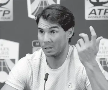  ?? ASSOCIATED PRESS ?? Rafael Nadal of Spain talks to media as he announces his withdraw from the Paris Masters tennis tournament at the Bercy Arena in Paris, France.