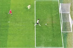  ??  ?? Germany’s midfielder Lars Stindl scores his team’s first goal during the 2017 Confederat­ions Cup final football match between Chile and Germany at Saint Petersburg Stadium in Saint Petersburg on July 2, 2017. - AFP photo