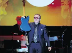  ?? CINDY ORD / GETTY IMAGES FOR LITTLE KIDS ROCK ?? Honoree Elvis Costello performs onstage during the Little Kids Rock Benefit 2017 in New York City.