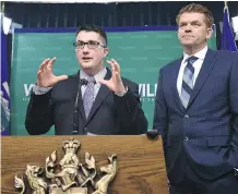  ?? ED KAISER ?? Wildrose House Leader Nathan Cooper, left, says he doesn’t believe Wildrose Leader Brian Jean is setting conditions for agreeing to a merger of the PC Party and the Wildrose.