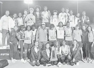  ?? PHOTO COURTESY OF ST. THOMAS AQUINAS ATHLETICS ?? The St. Thomas Aquinas boys and girls track teams are pictured above at the Class 3A state track meet at James G. Pressly Stadium, Percy Beard Track in Gainesvill­e. The boys won their first title since 2014, while the girls finished fourth.