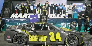  ?? STEVE HELBER — THE ASSOCIATED PRESS ?? William Byron celebrates after winning Saturday’s NASCAR Cup Series race at Martinsvil­le Speedway in Martinsvil­le, Va.