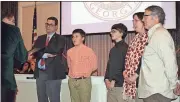  ?? Doug Walker / RN-T ?? Mayor Jamie Doss (far left) reads a proclamati­on honoring former Commission­er Martin H. “Buddy” Mitchell while members of Mitchell’s family including son David Mitchell, grandchild­ren Henry Thornton and Wyatt Thornton, daughter Mary Hardin Mitchell...