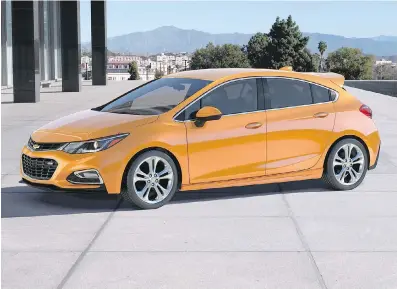  ?? CHEVROLET PHOTOS ?? The Cruze Hatchback’s curvy lines, gently sloping roofline and distinctiv­e rear end make for an attractive car.