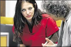  ?? SHMUEL THALER / AP 2014 ?? Alix Tichelman (left) confers with public defender Diane August during her arraignmen­t in Santa Cruz Superior Court in Santa Cruz, Calif.