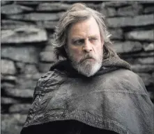 ?? Lucasfilm ?? The Associated Press Mark Hamill reprising his iconic role as Luke Skywalker in “Star Wars: The Last Jedi” is helping pack in the moviegoers, but 2017 will see a falloff in ticket sales in the in the U.S. and Canada.