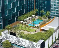  ?? SWENSON, AMCAL ?? The swimming pool and gathering areas of The Grad, a 19-story, 260-unit housing high-rise on East San Carlos Street between South Second Street and South Third Street in downtown San Jose are shown in this concept drawing.