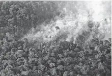  ?? REUTERS ?? An aerial view of a tract of Amazon jungle burning as it is cleared by farmers in Itaituba, Para, Brazil on Sept. 26, 2019.